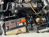 a small engine in the trunk of a car