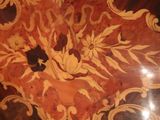 a picture of a decorative table top with a flower design on it
