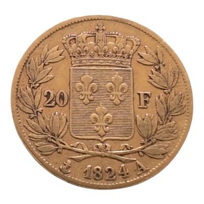 Gros plan sur une pièce de monnaie ornée d'une couronne
