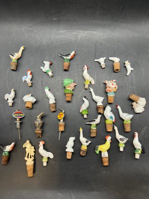 a lot of small figurines that are on a table
