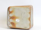 a small piece of pottery that is sitting on a table