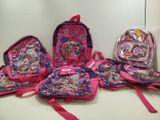 a lot of bags that are sitting on a table