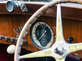 a close up of a steering wheel and dashboard of a car