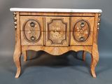 a small wooden chest with three drawers and a marble top