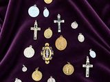 purple velvet with a bunch of silver and gold crosses and crosses on it