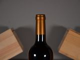 a bottle of wine that is sitting on a table