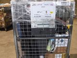 a metal cart with a sign on top of it in a warehouse