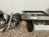 many pots and pans that are on the counter