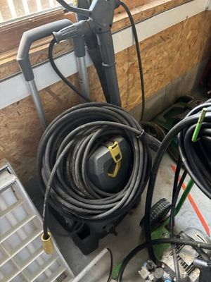 a lot of hoses that are sitting on the floor