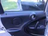 a car door open with the driver ' s side door open