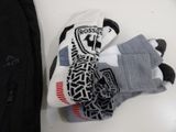 a pair of socks and a backpack on a table