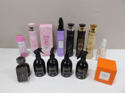 several different types of perfumes are lined up on a table