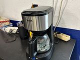 a coffee maker that is on top of a counter