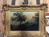 tableau posé sur un chevalet dans une pièce où se trouve une croix
