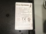 a label on the back of a laptop that says bocca systems