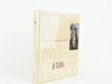the book is sitting on a white surface with a white background