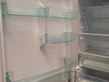 a refrigerator with its door open and shelves full of food