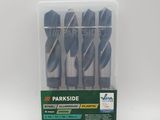 a set of four dark blue drill bits in a plastic box
