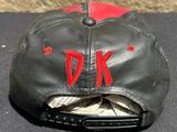 a baseball cap with the word dk written on it