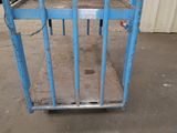 a blue gate with a sign on it that says 766