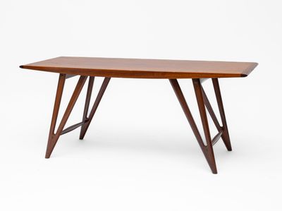 a wooden table with two legs and a wooden top