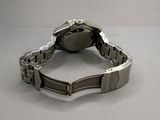 an image of a close up of a wrist watch on a table