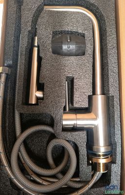 a box with a hose and a hose attached to it