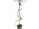 wrought iron candle holder with spiral design and metal base