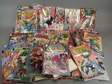 a pile of comics sitting on top of each other on a table