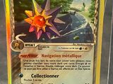 a close up of a pokemon card in a plastic case