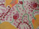 a close up of a piece of fabric on a cutting board