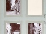 four black and white photographs of a city street with buildings