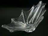 a glass bowl that is sitting on a table
