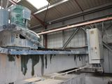 a picture of a machine that is working on a piece of metal