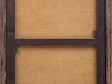 a close up of an old wooden frame with a brown background