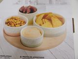 a box of chips and dips sitting on a table