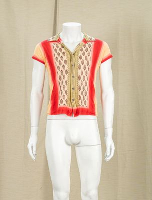 an image of a mannequin dressed in a red and yellow shirt