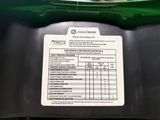 a picture of a green motorcycle with a list of parts on it