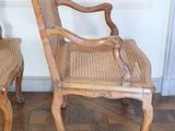 two chairs that are sitting next to each other on the floor
