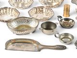a lot of silver items that are on the table