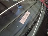 a sticker on the windshield of a car that says hello yeah