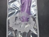 a plastic bag with a purple object inside of it
