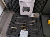 a case with tools in it sitting on a table