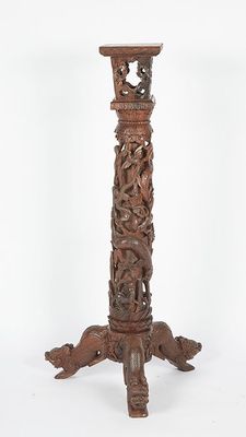 an old wooden table with carvings on it and a white background