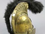helmet of a roman soldier with plumes and feathers on a white background