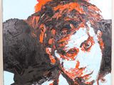 une image représentant un tableau d'une femme peinte à l'orange et au noir