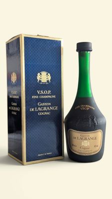 bottles of wine and a box on a white surface