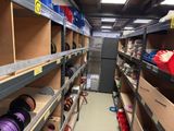 many shelves with different types of items on them