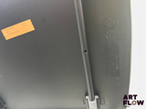 a picture of a piece of metal with a sticker on it