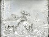 an image of a metal plaque depicting two deers and a dog